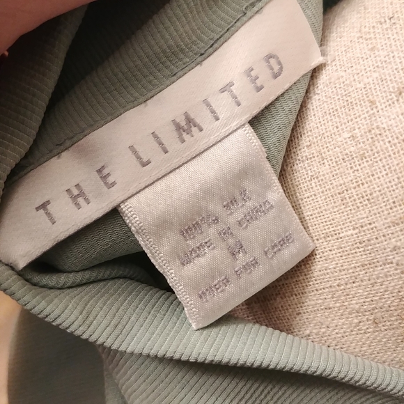 The Limited Size Medium button up top - Picture 3 of 3